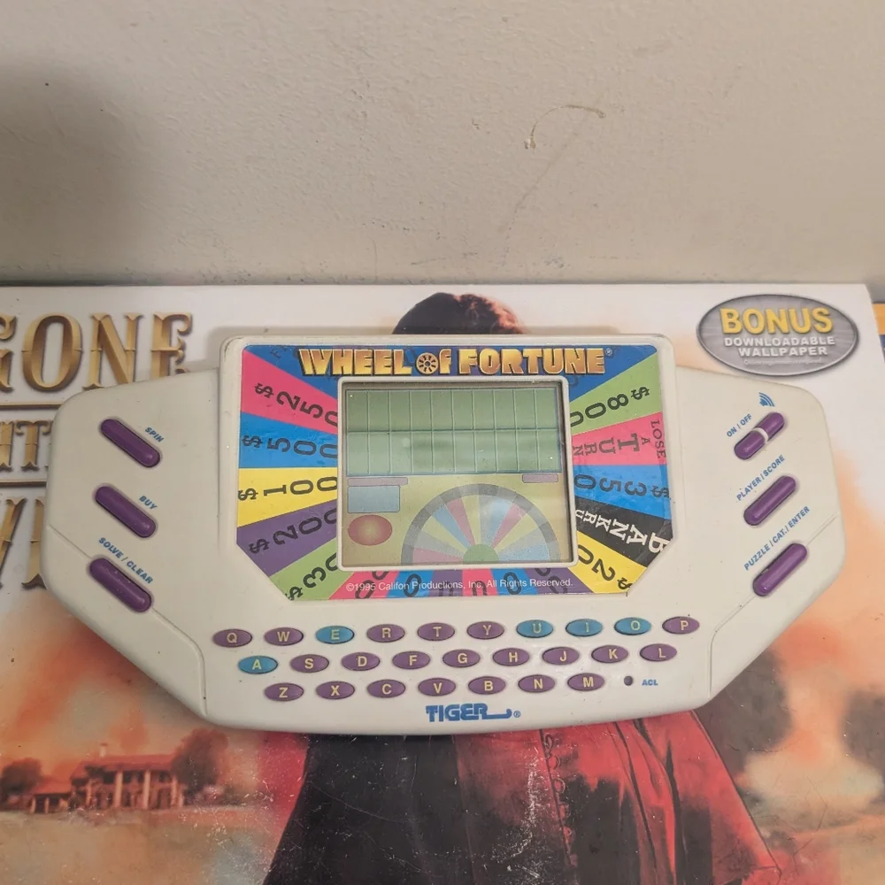 Vintage 1995 Tiger Wheel of Fortune Electronic Hand Held Game & Cart Ridge Works